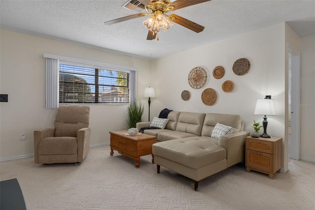 2300 Restmere Lane Spring Hill, FL 34609 - Photo 4 of 28 a living room with furniture and window