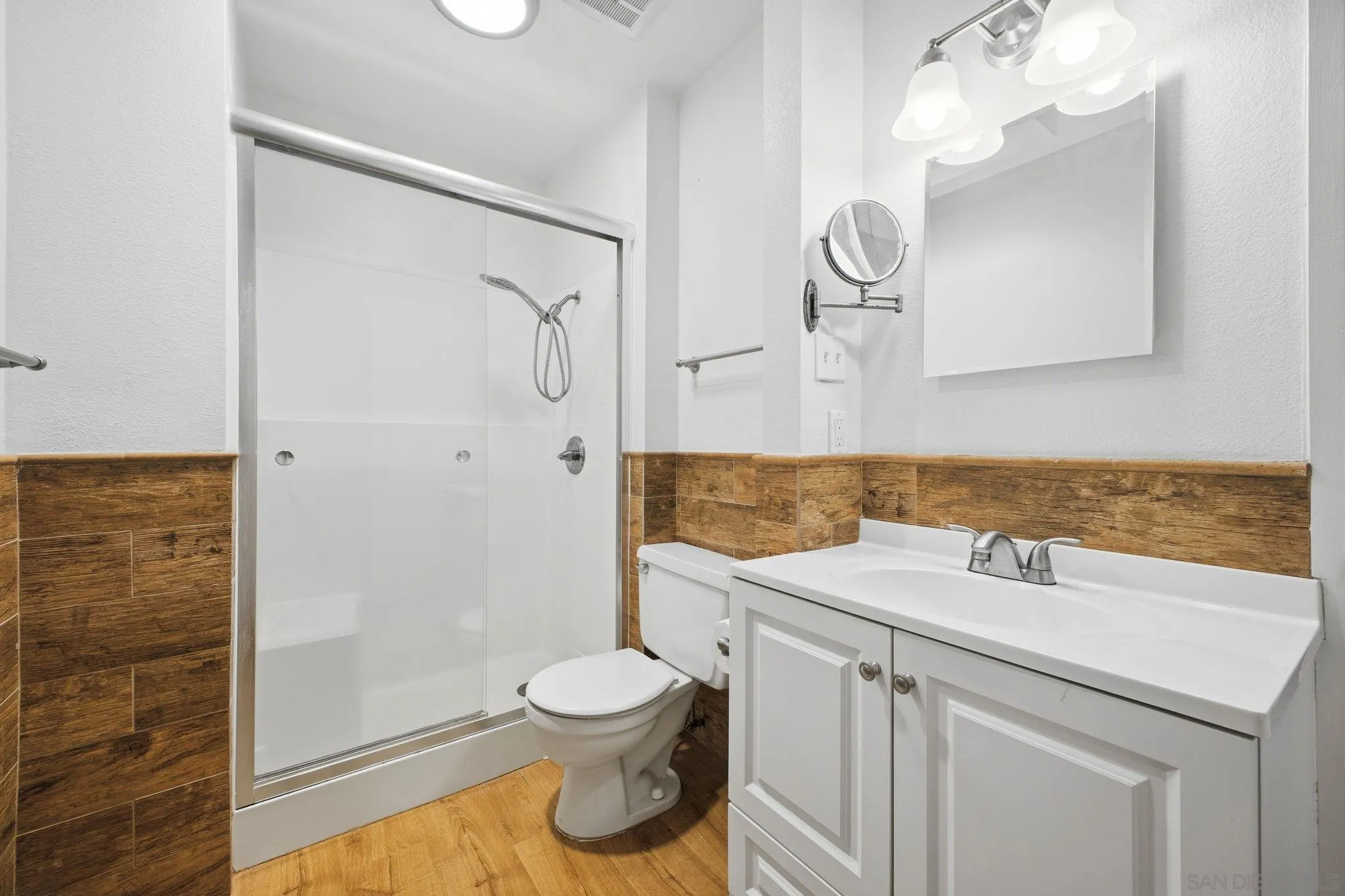 6019 Rancho Mission Road, Unit 204 San Diego, CA 92108 - Photo 23 of 38 Upgraded spacious primary bathroom with shower