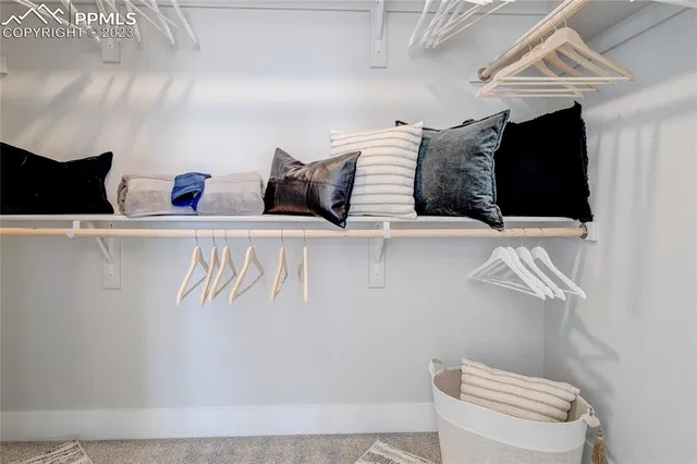 a bathroom with a toilet and a tub