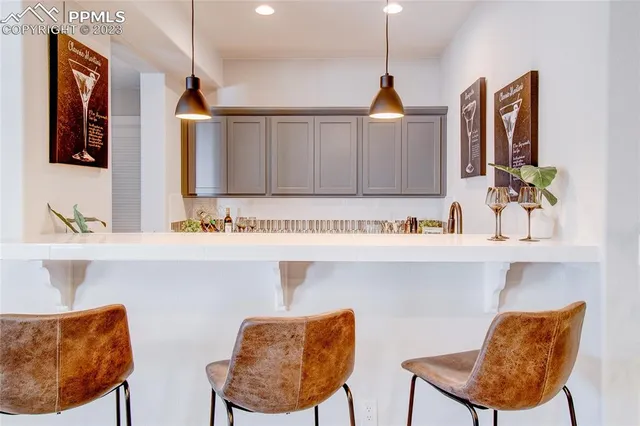 a bed room with furniture and a fireplace