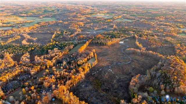 an aerial view of city and lake view