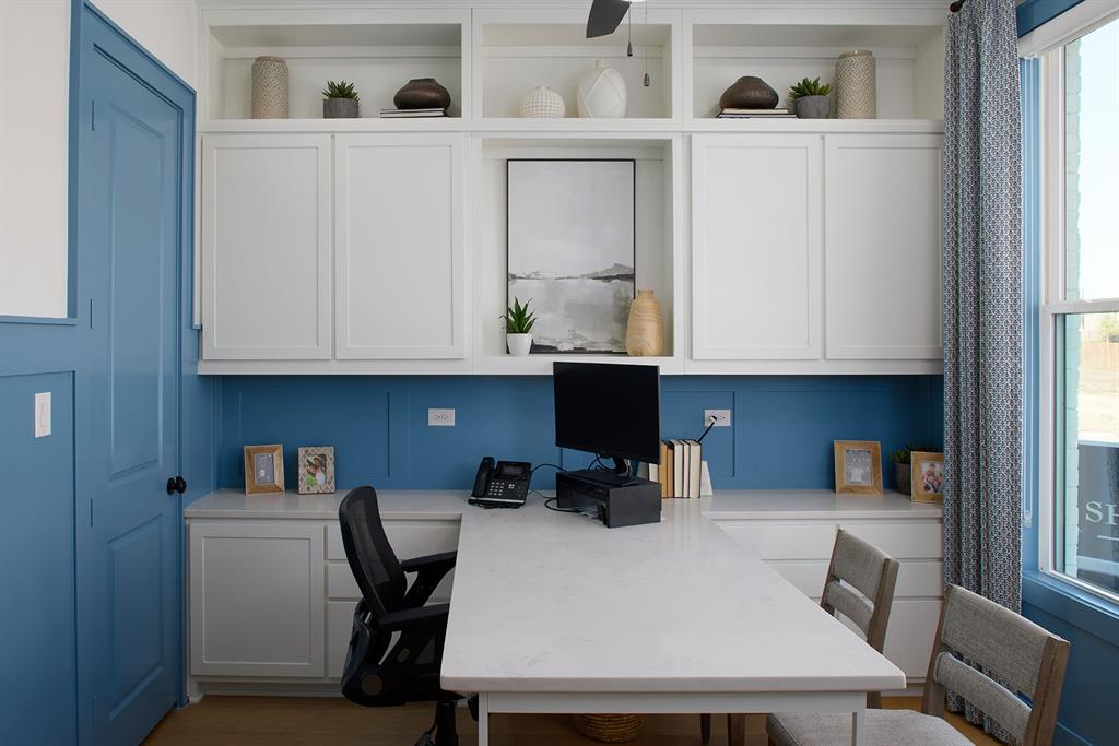 651 Caprice Bluff Fate, TX 75189 - Photo 24 of 26 a view of kitchen and workspace