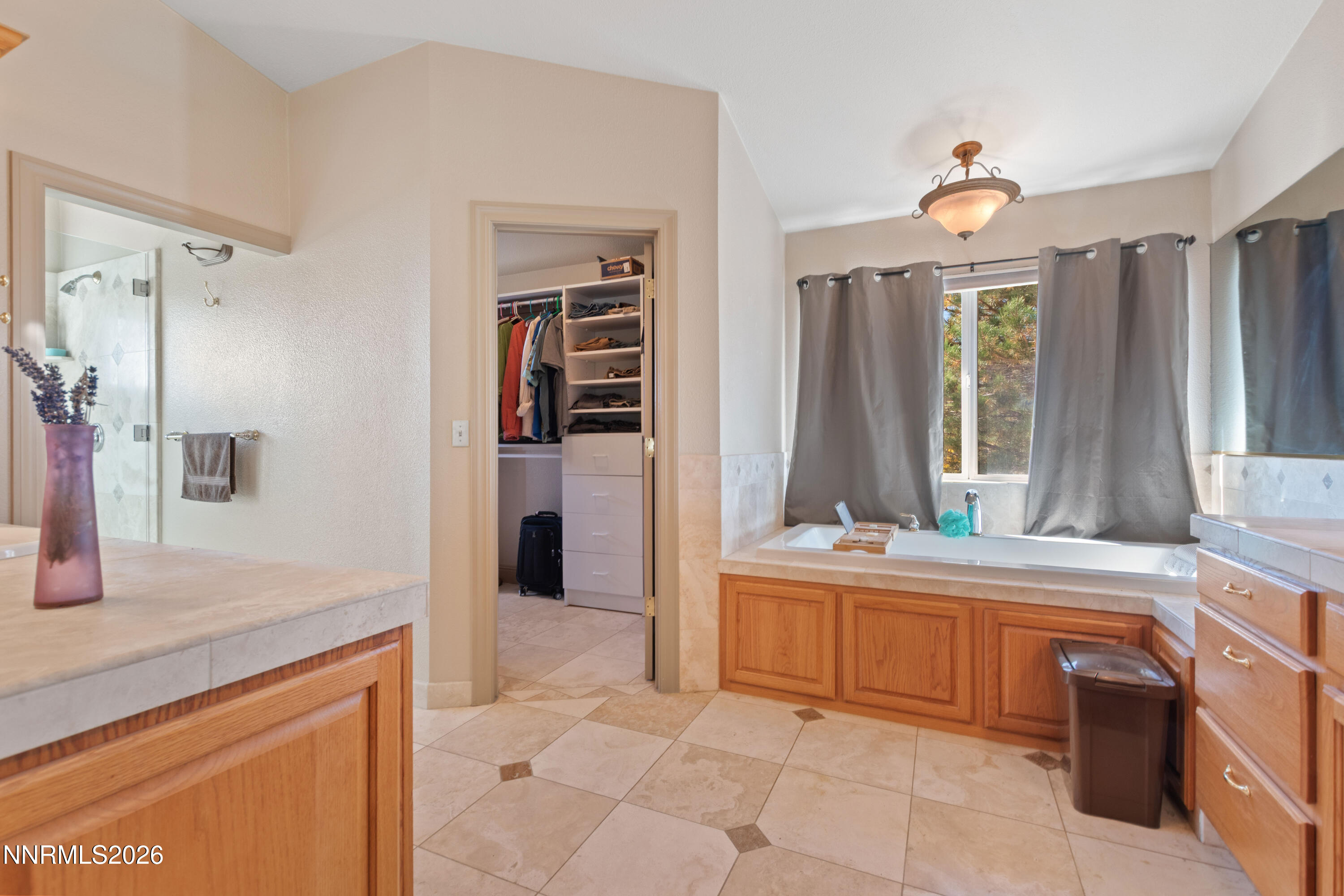 480 Duck Hill Road Washoe Valley, NV 89704 - Photo 12 of 27 a kitchen with stainless steel appliances a sink and a refrigerator