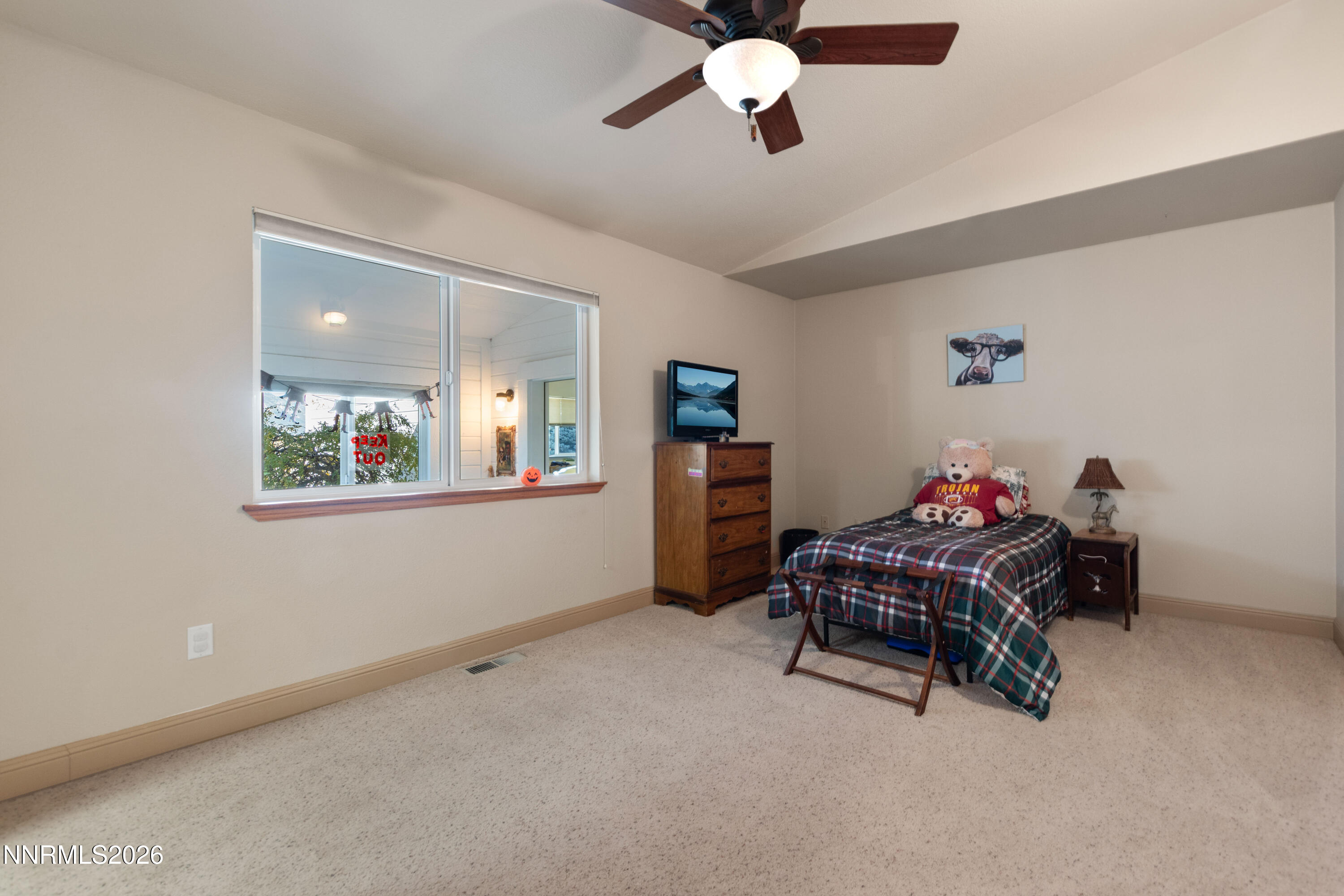 480 Duck Hill Road Washoe Valley, NV 89704 - Photo 17 of 27 a living room with furniture and a ceiling fan