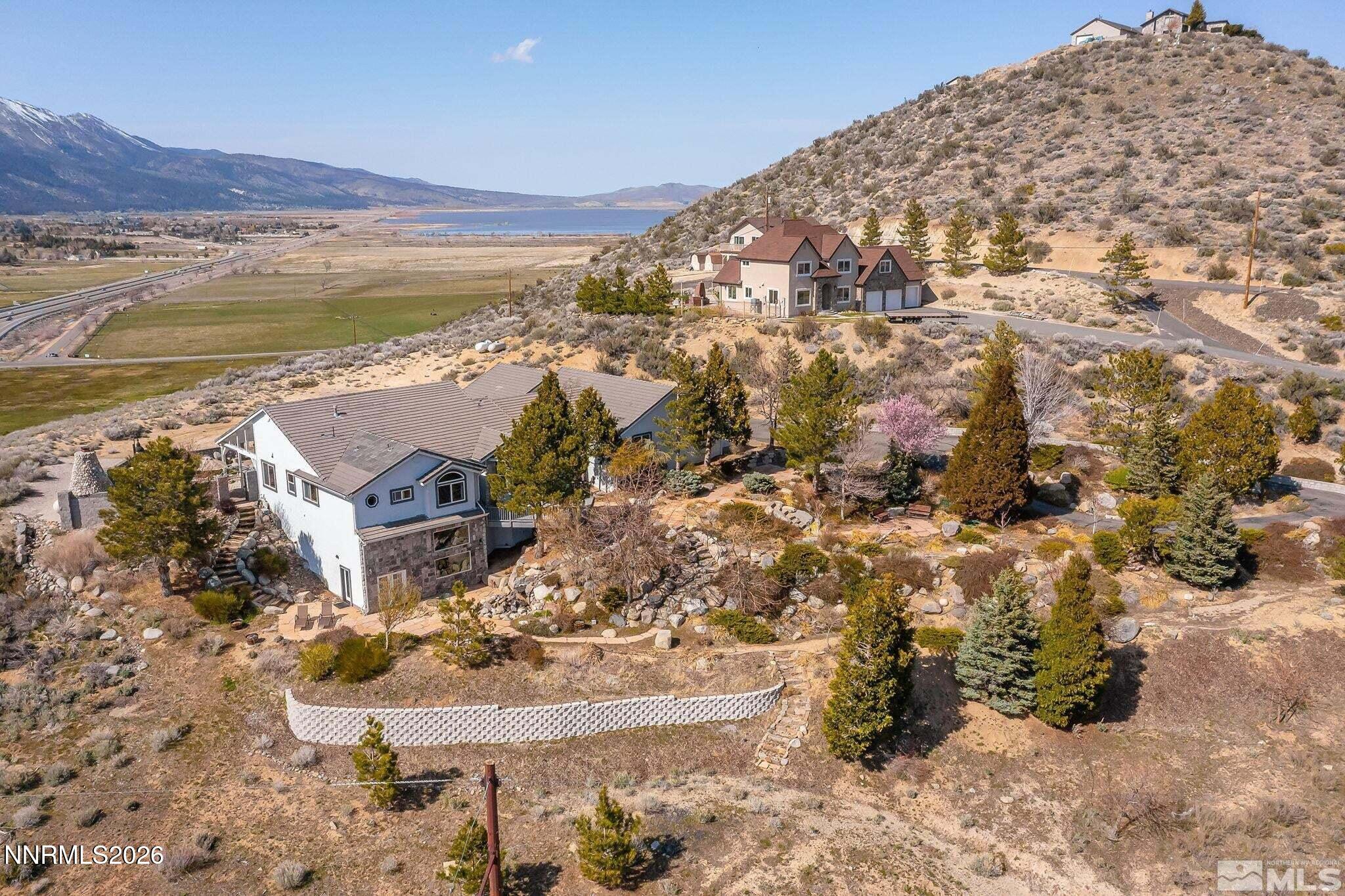 480 Duck Hill Road Washoe Valley, NV 89704 - Photo 2 of 27 a view of lake and mountain