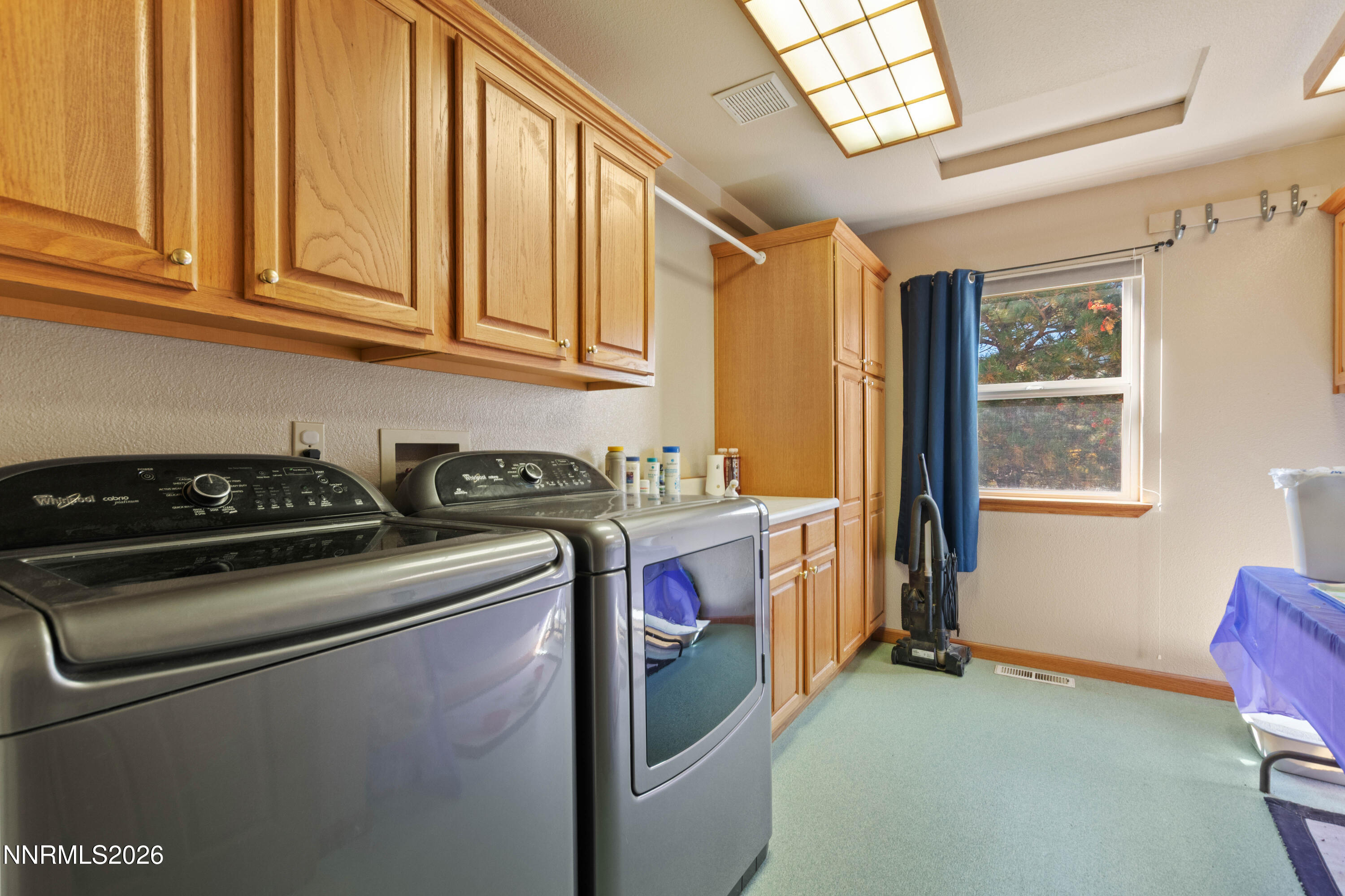 480 Duck Hill Road Washoe Valley, NV 89704 - Photo 22 of 27 a utility room with dryer and washer