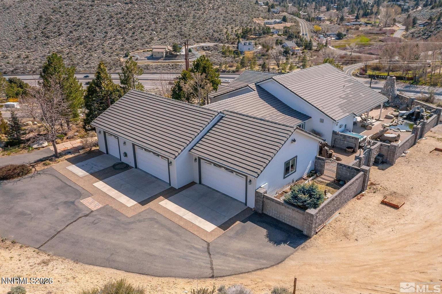 480 Duck Hill Road Washoe Valley, NV 89704 - Photo 3 of 27 a view of a terrace with sitting area