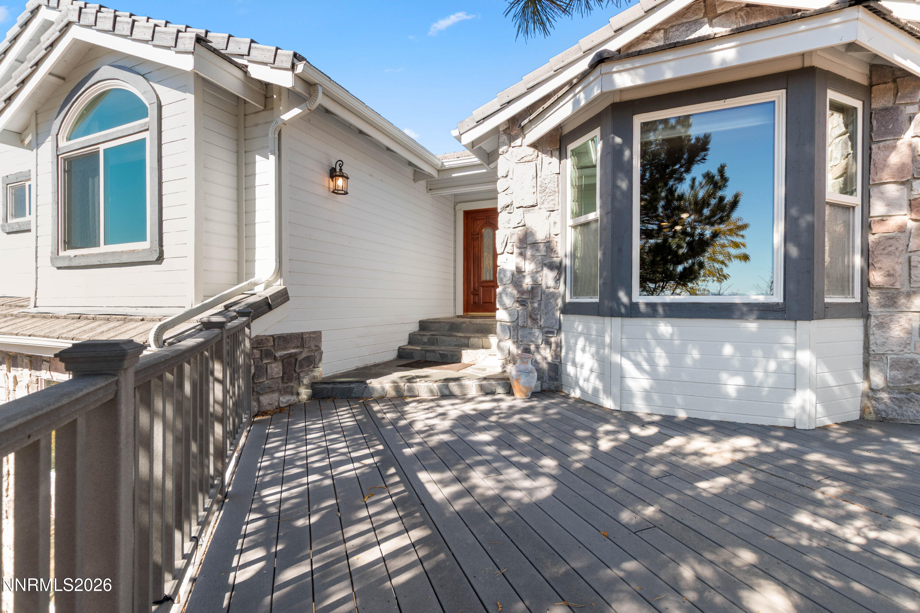 480 Duck Hill Road Washoe Valley, NV 89704 - Photo 4 of 27 a front view of a house with a yard