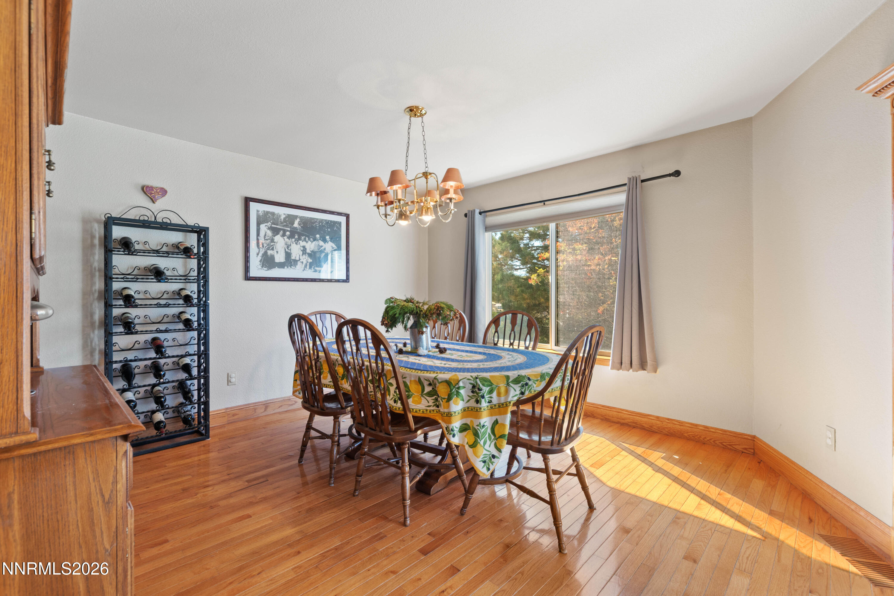 480 Duck Hill Road Washoe Valley, NV 89704 - Photo 7 of 27 a view of a dining room with furniture window and wooden floor