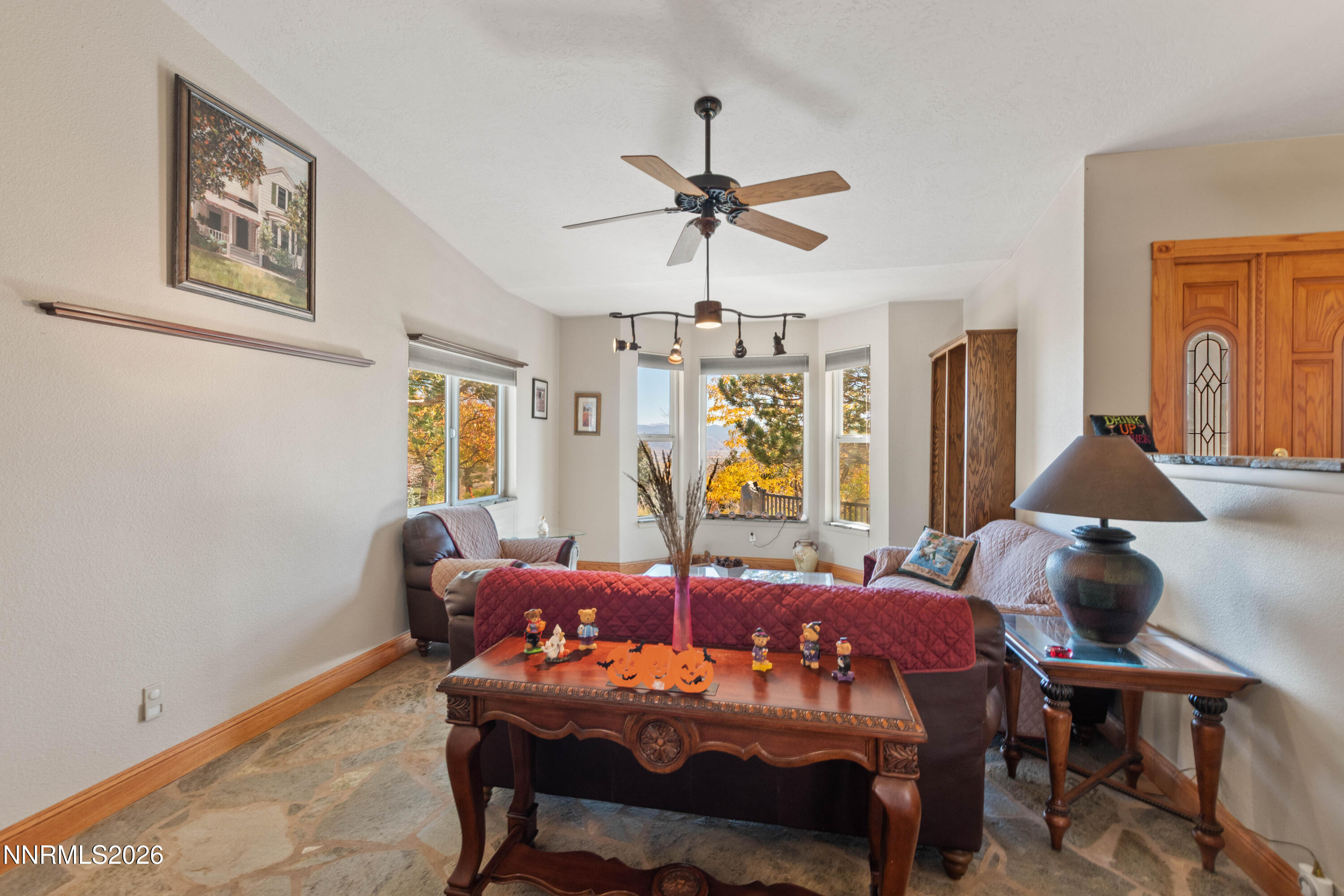 480 Duck Hill Road Washoe Valley, NV 89704 - Photo 8 of 27 a view of a dining room with furniture and window
