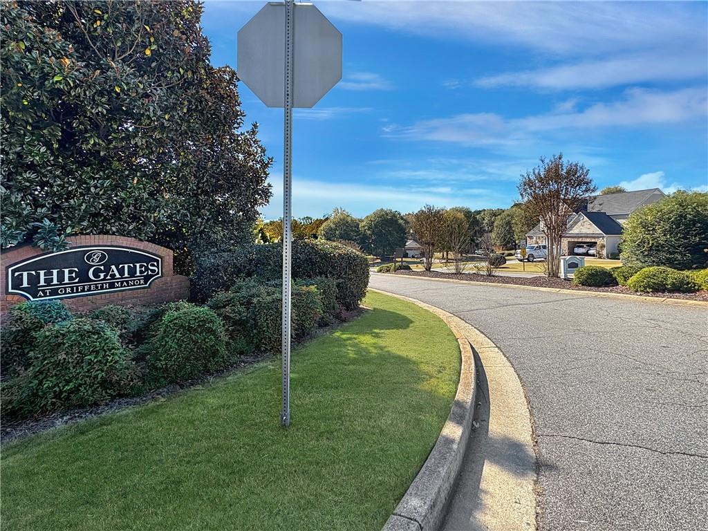 637 Sleeping Meadow Lane Bethlehem, GA 30620 - Photo 12 of 12 a sign board with a play ground