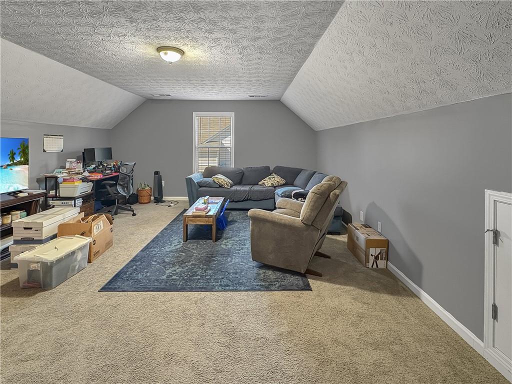 637 Sleeping Meadow Lane Bethlehem, GA 30620 - Photo 9 of 12 a living room with furniture