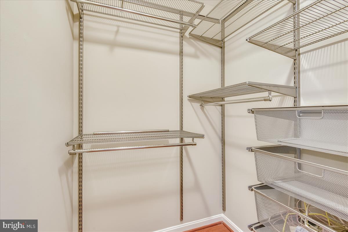 2220 Springwood Drive, Unit 102B Reston, VA 20191 - Photo 17 of 24 Master Bedroom Walk In Closet