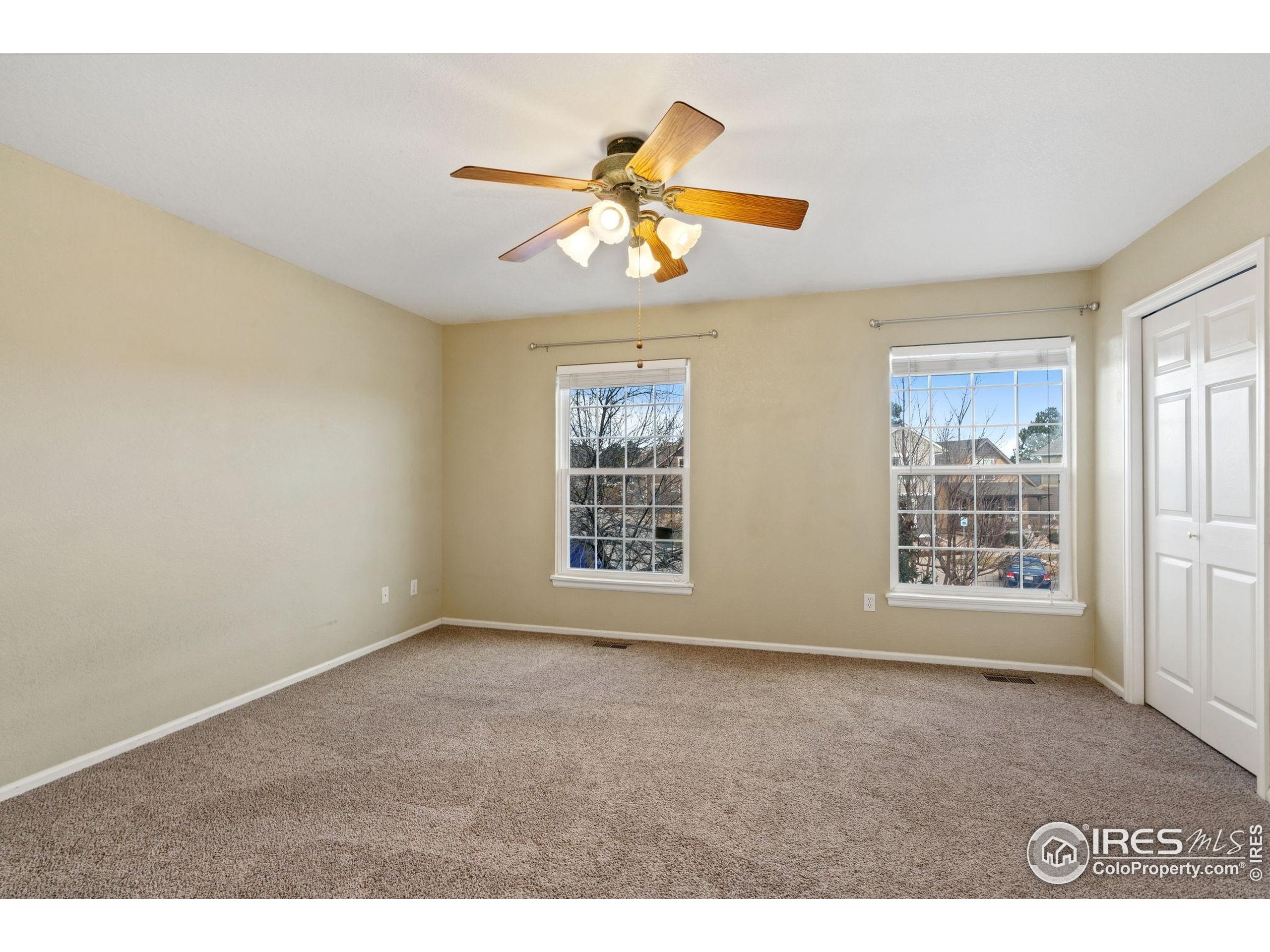 6612 Avondale Road, Unit 2B Fort Collins, CO 80525 - Photo 8 of 20 a view of an empty room with a window