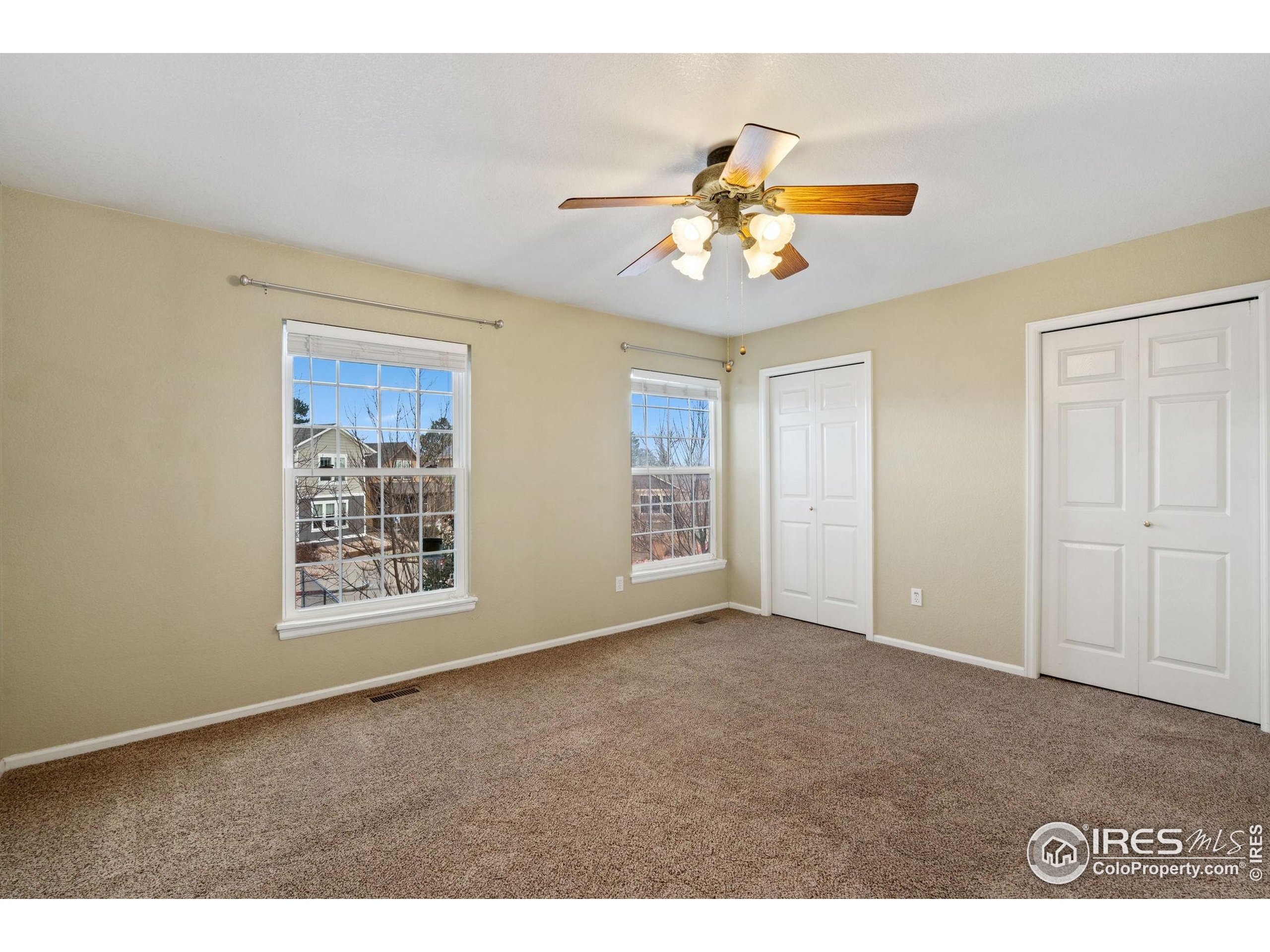 6612 Avondale Road, Unit 2B Fort Collins, CO 80525 - Photo 9 of 20 a view of an empty room with a window