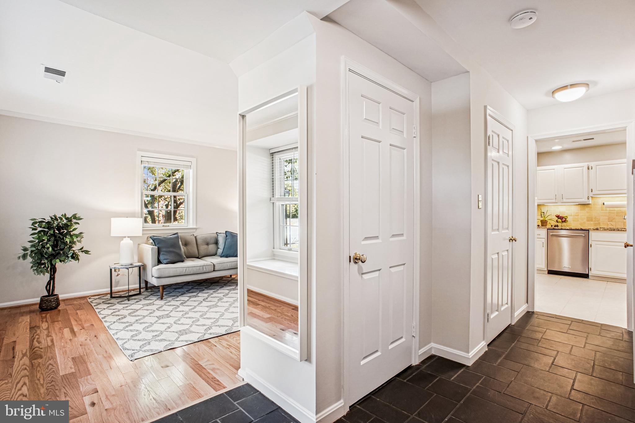 6719 Fairfax Road, Unit 67 Chevy Chase, MD 20815 - Photo 2 of 24 a view of a livingroom with furniture and entryway