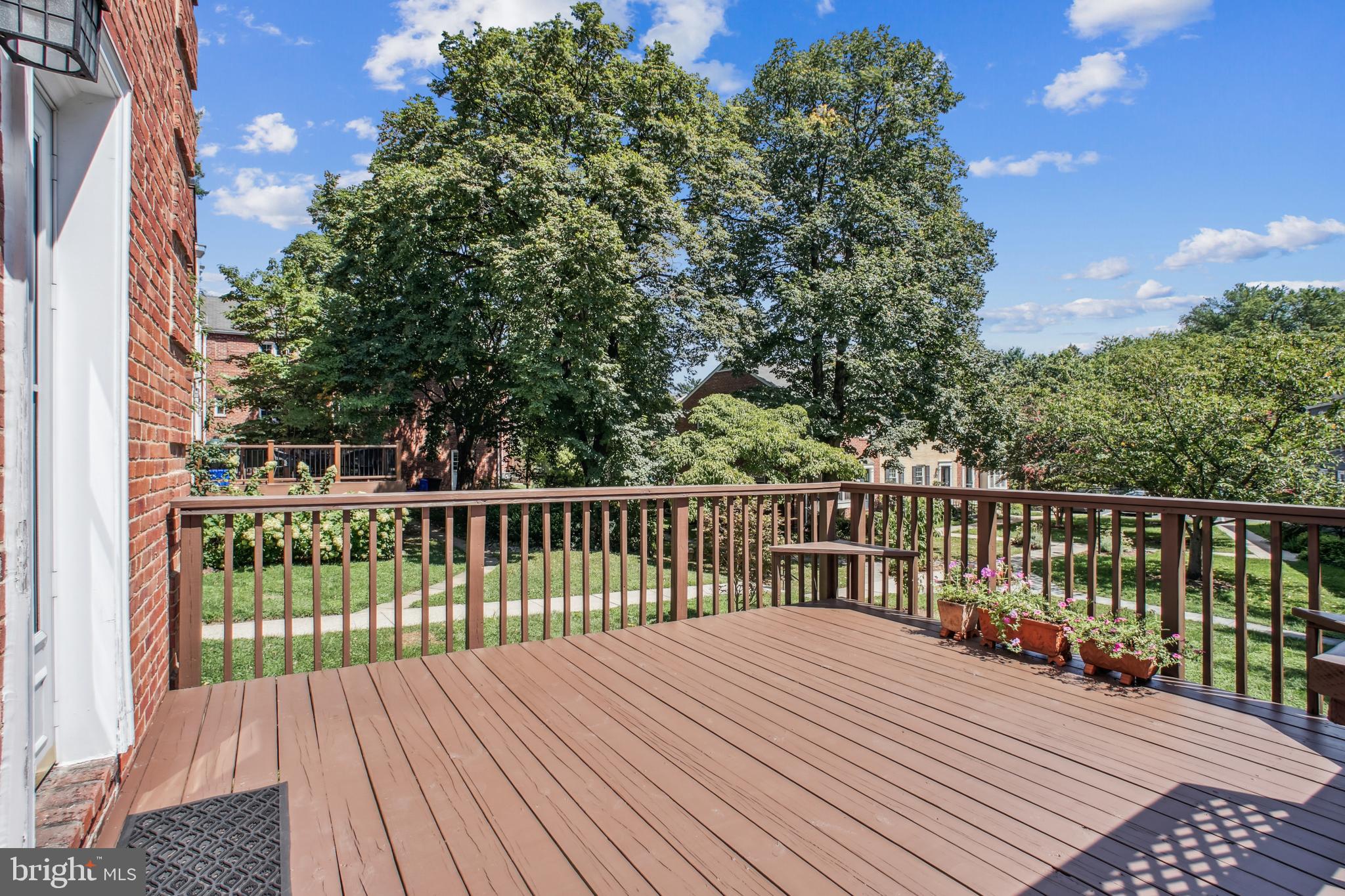 6719 Fairfax Road, Unit 67 Chevy Chase, MD 20815 - Photo 23 of 24 a view of a wooden roof deck