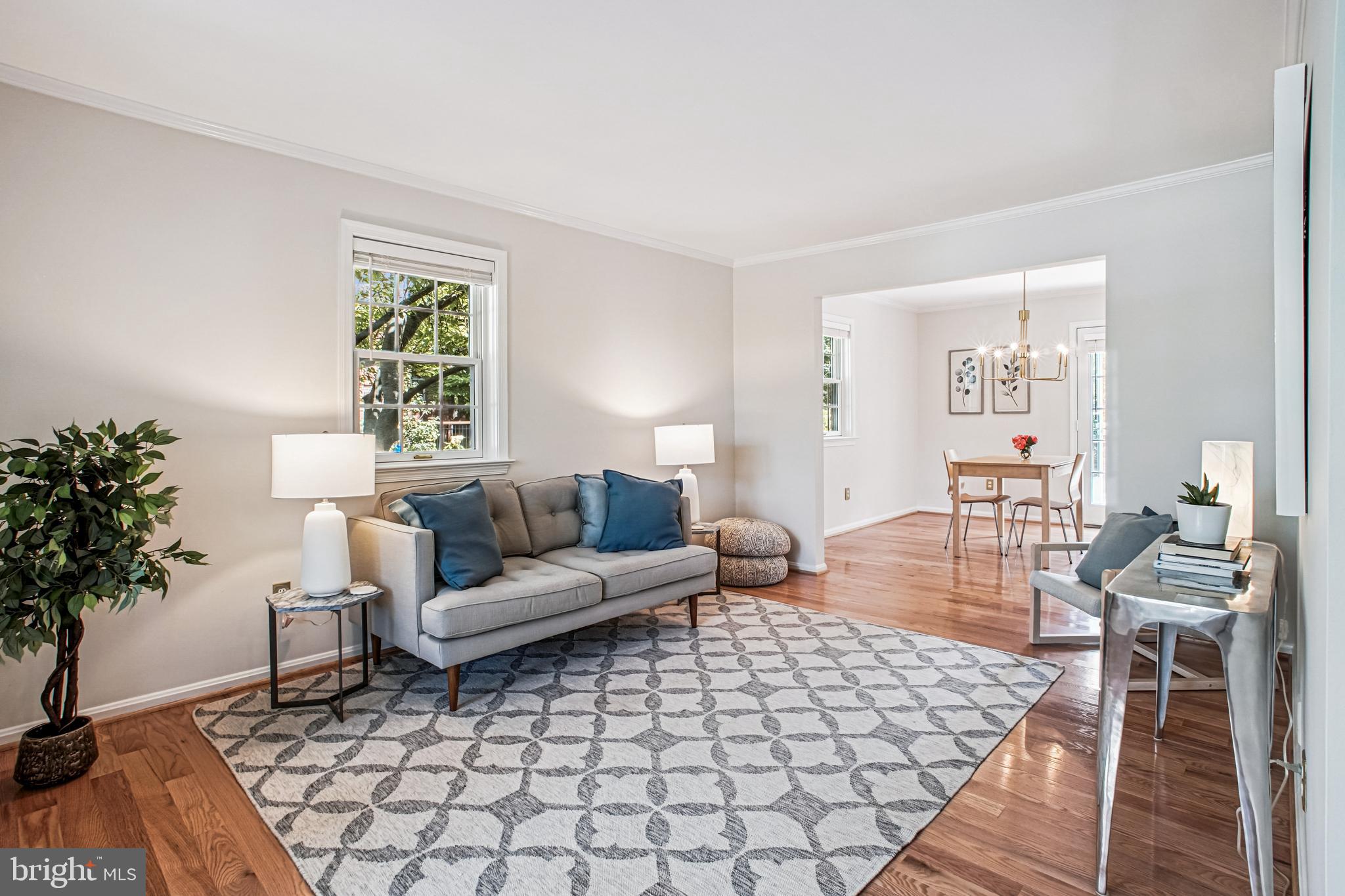 6719 Fairfax Road, Unit 67 Chevy Chase, MD 20815 - Photo 3 of 24 a living room with furniture and a window