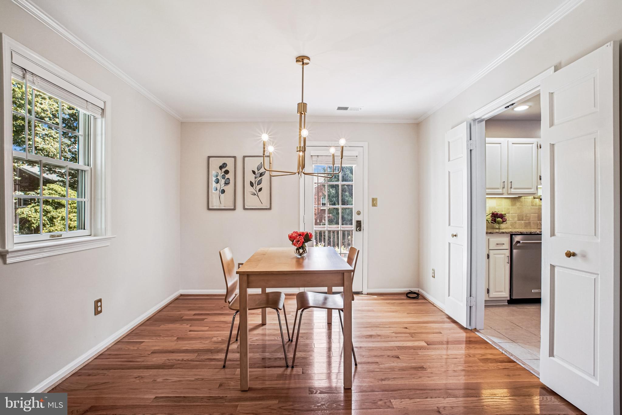 6719 Fairfax Road, Unit 67 Chevy Chase, MD 20815 - Photo 7 of 24 a living room with furniture and a wooden floor