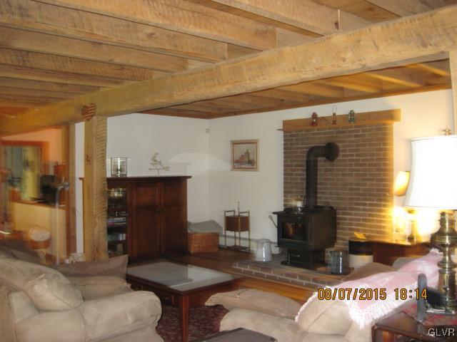 953 Clearfield Road Nazareth, PA 18064 - Photo 13 of 25 a living room with furniture and a fireplace