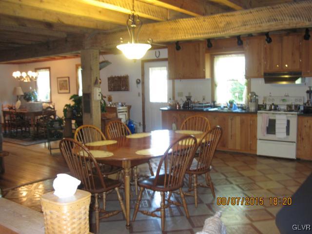 953 Clearfield Road Nazareth, PA 18064 - Photo 14 of 25 a dining table with chairs and chandelier