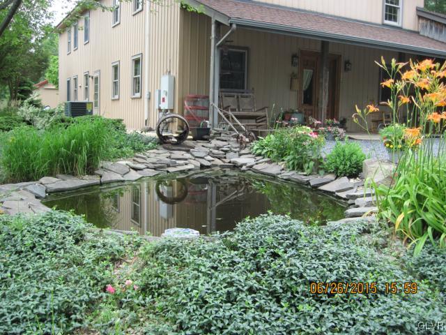 953 Clearfield Road Nazareth, PA 18064 - Photo 3 of 25 a view of house with swimming pool and garden
