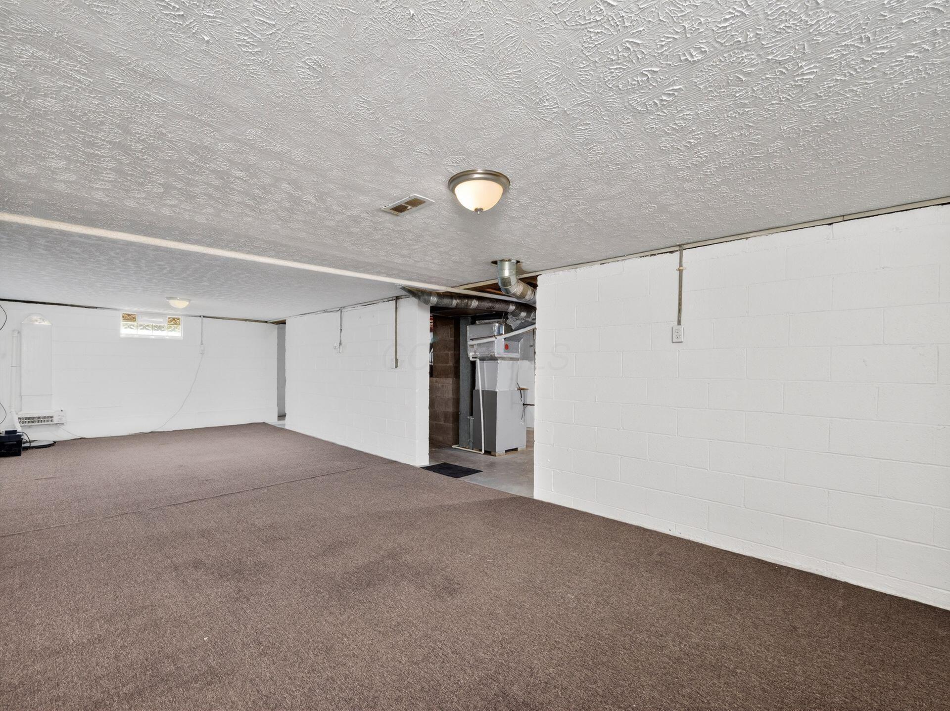 3085 Gerbert Road Columbus, OH 43224 - Photo 29 of 34 Basement Rec Room - 30'8" x 12'6"