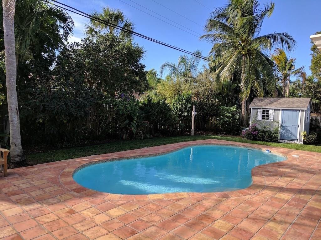 1400 Southwest 9th Street Boca Raton, FL 33486 - Photo 8 of 8 a view of a swimming pool with a patio