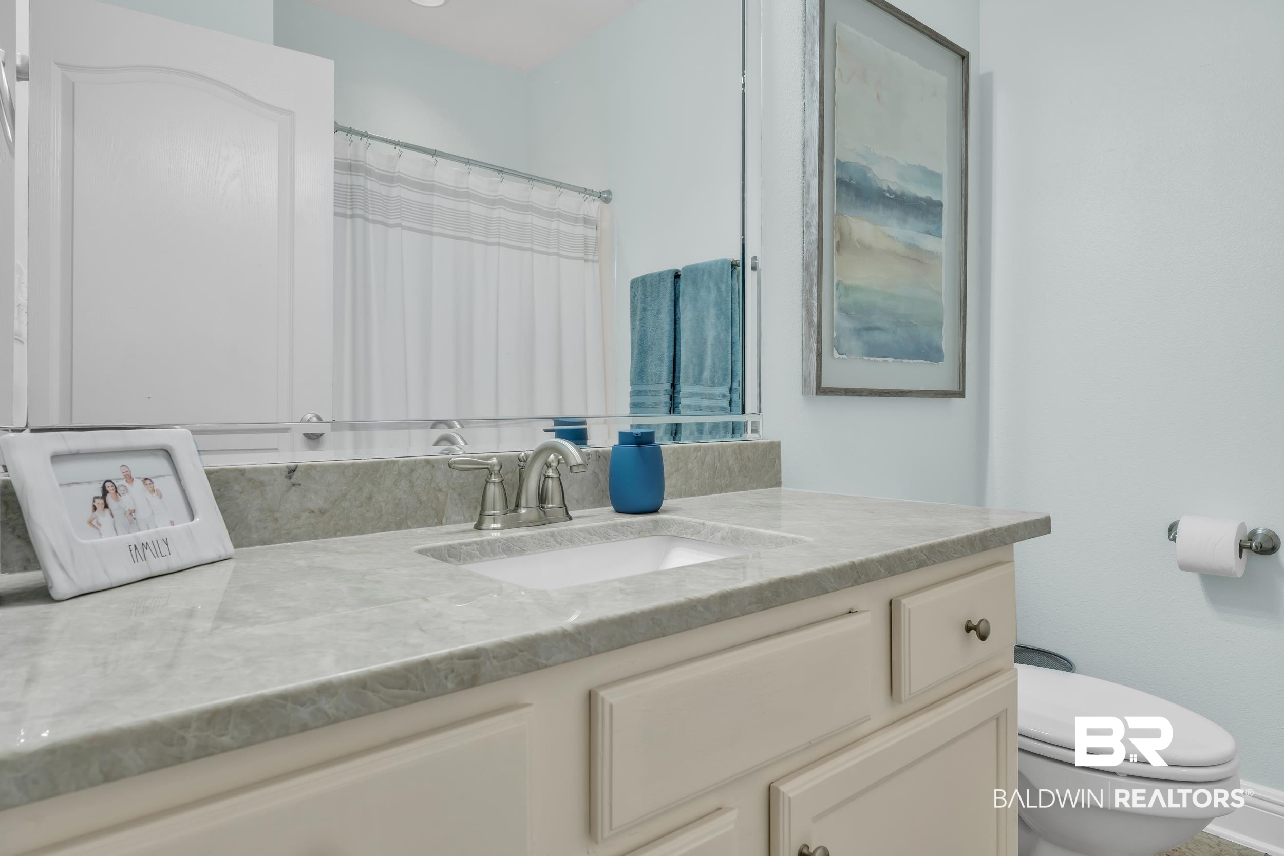 7109 Rocky Rd Loop Gulf Shores, AL 36542 - Photo 25 of 30 Bathroom featuring vanity and toilet