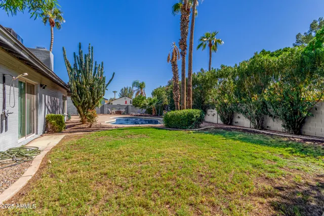 a view of a backyard with a garden