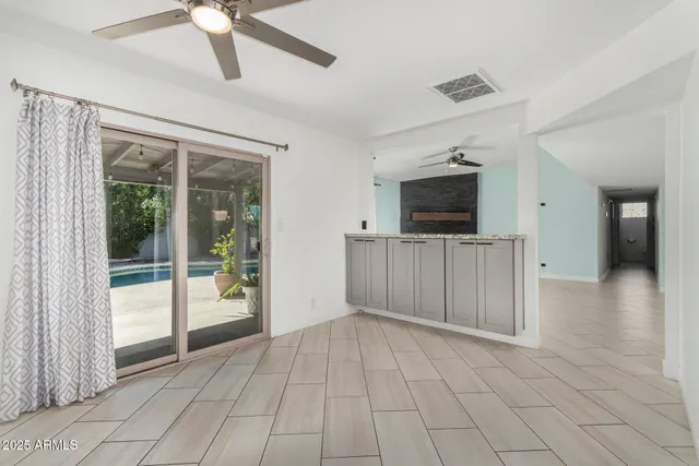 a view of a livingroom with a flat screen tv