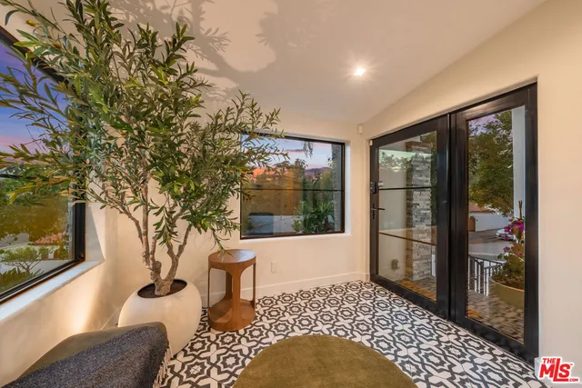 a vase of flowers sitting on a table