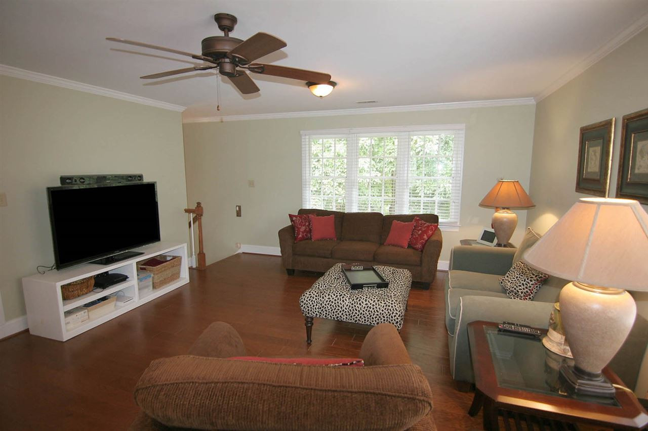 7903 Laurel Mountain Road Raleigh, NC 27613 - Photo 23 of 25 Bonus Room has abundant Windows to let in the Sunshine. Access includes Bonus Staircase from 1st Floor + Hallway Entrance from Second Floor. Bonus Room