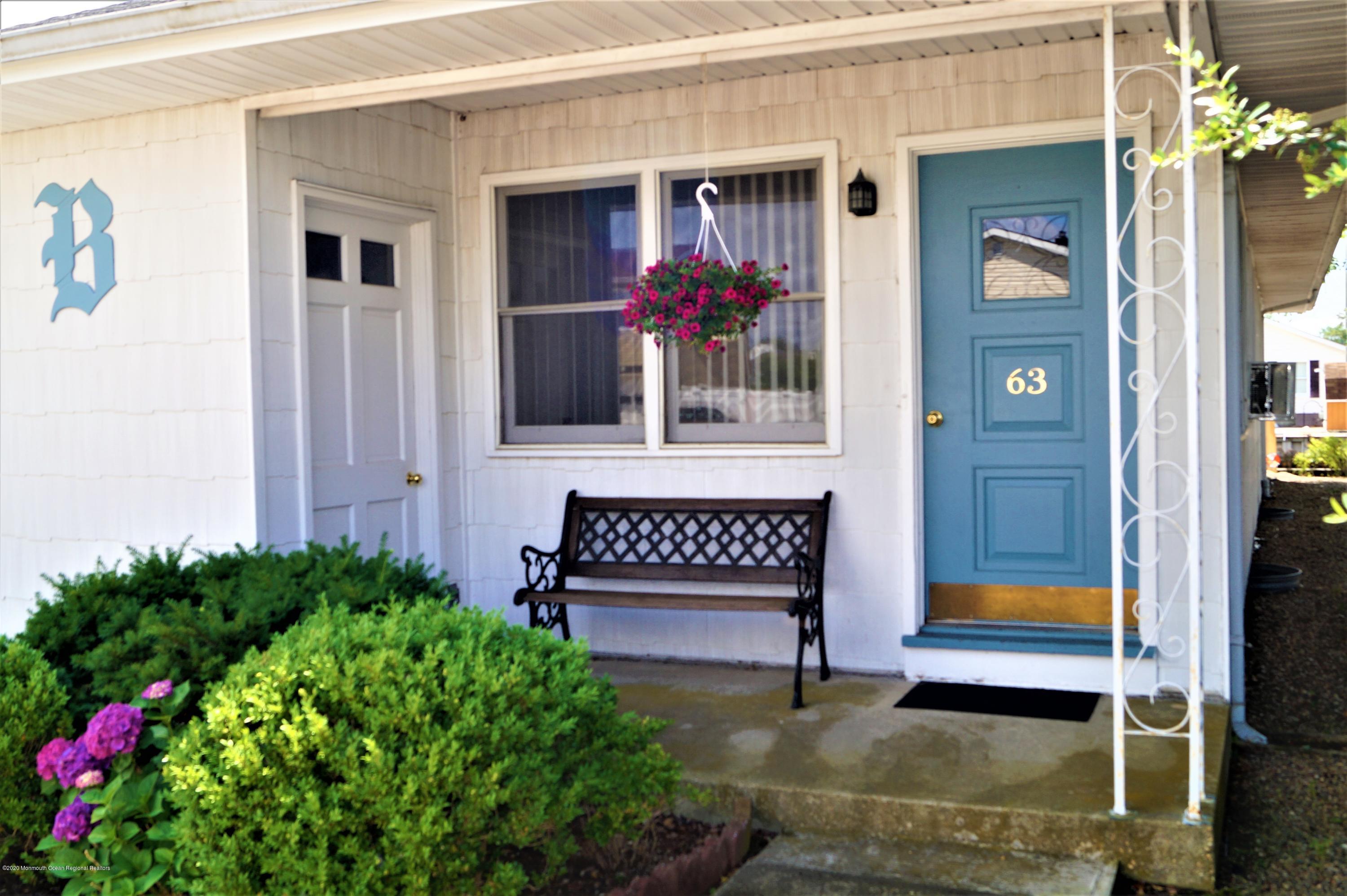 63 Mizzen Road Brick, NJ 08723 - Photo 5 of 37 a view of front door of house and entertaining space