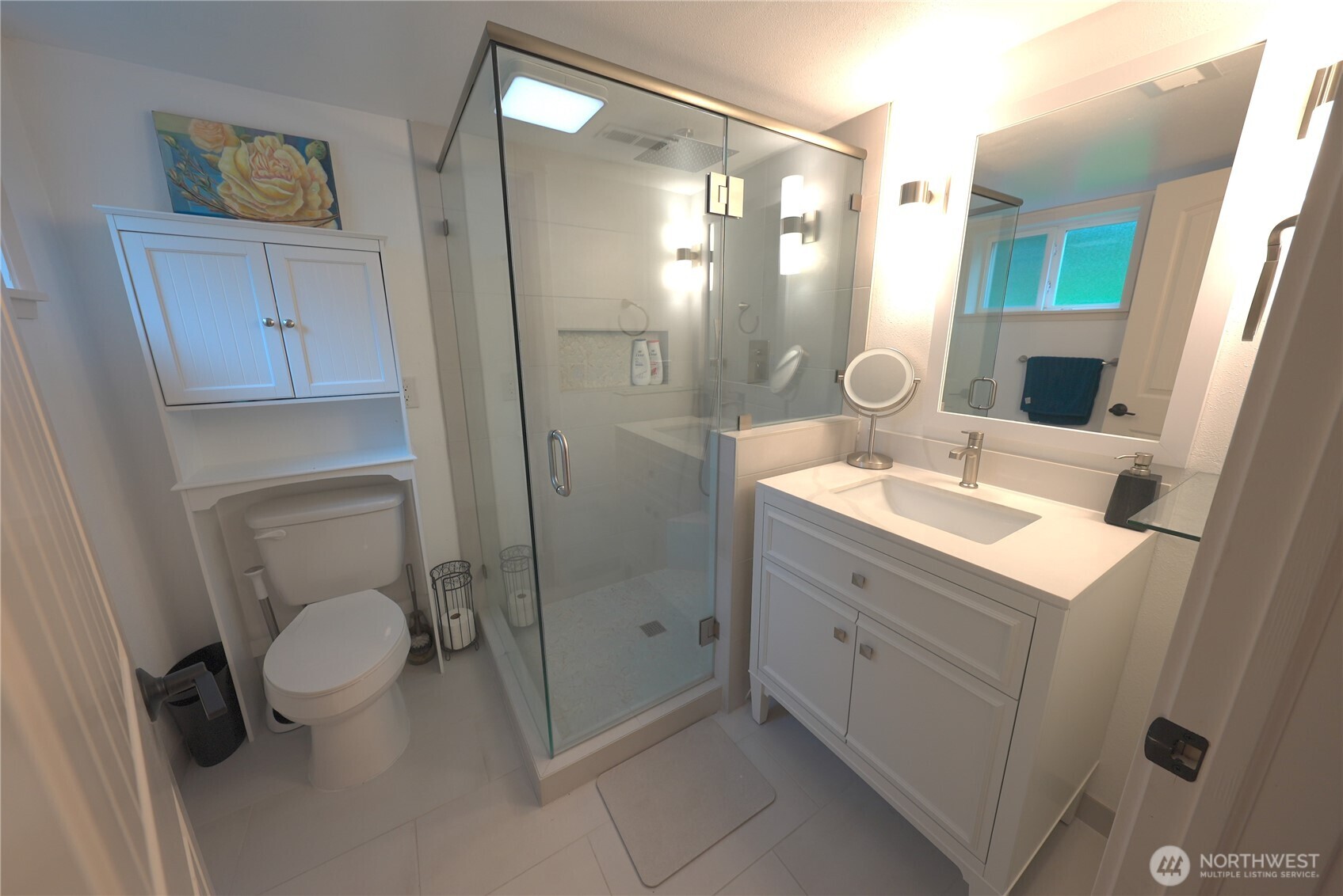 17812 Southeast 146th Street Renton, WA 98059 - Photo 17 of 39 a bathroom with a sink a toilet and shower