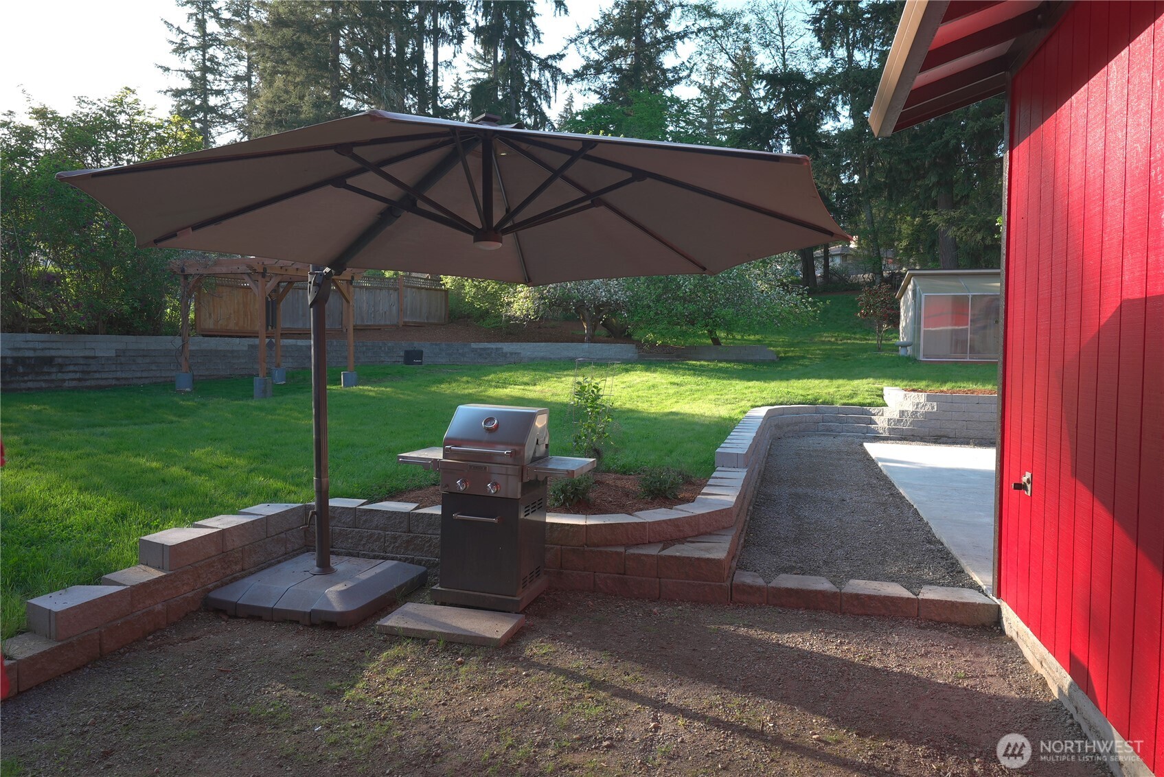 17812 Southeast 146th Street Renton, WA 98059 - Photo 24 of 39 a view of a chair and table in the garden