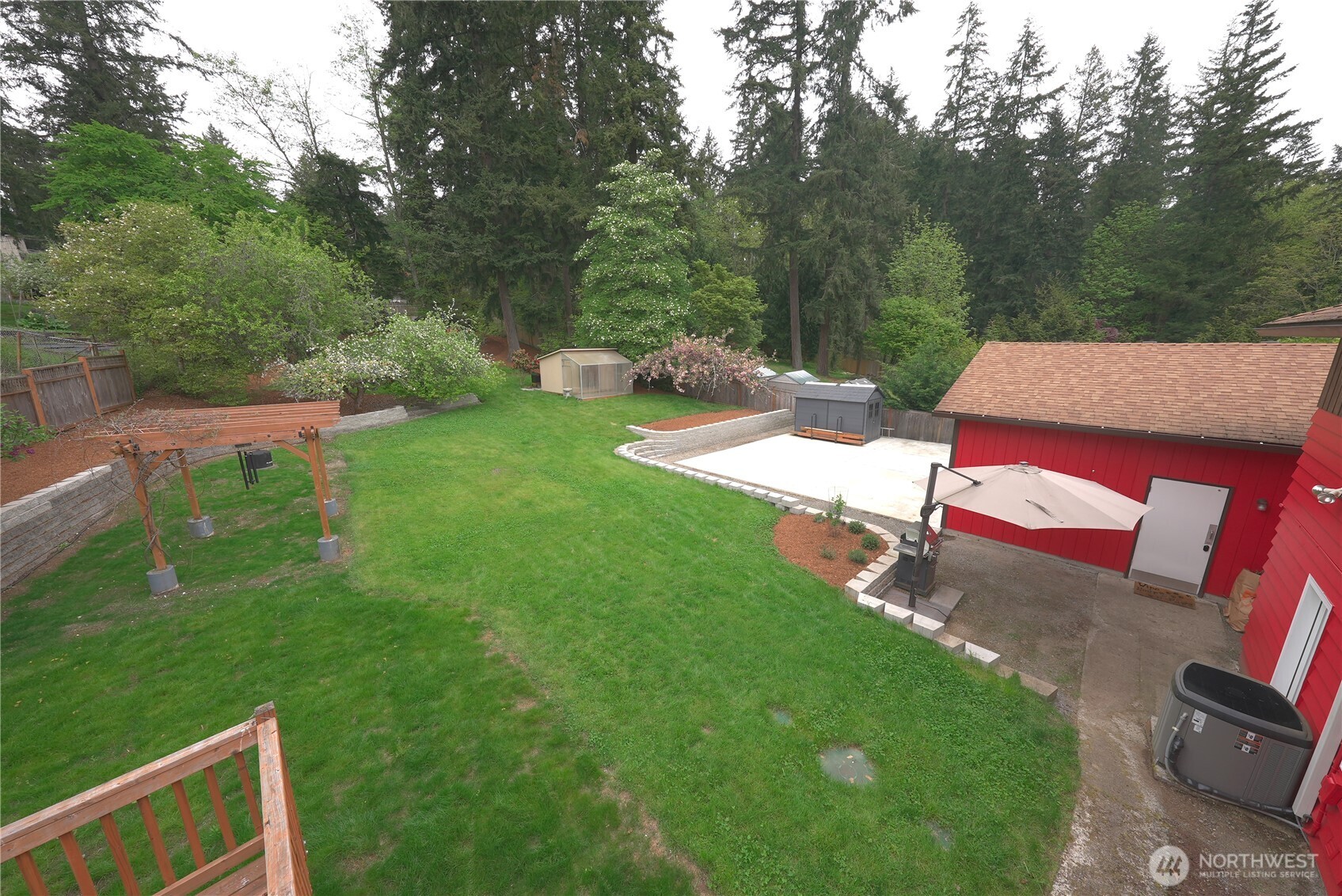 17812 Southeast 146th Street Renton, WA 98059 - Photo 33 of 39 a backyard of a house with table and chairs