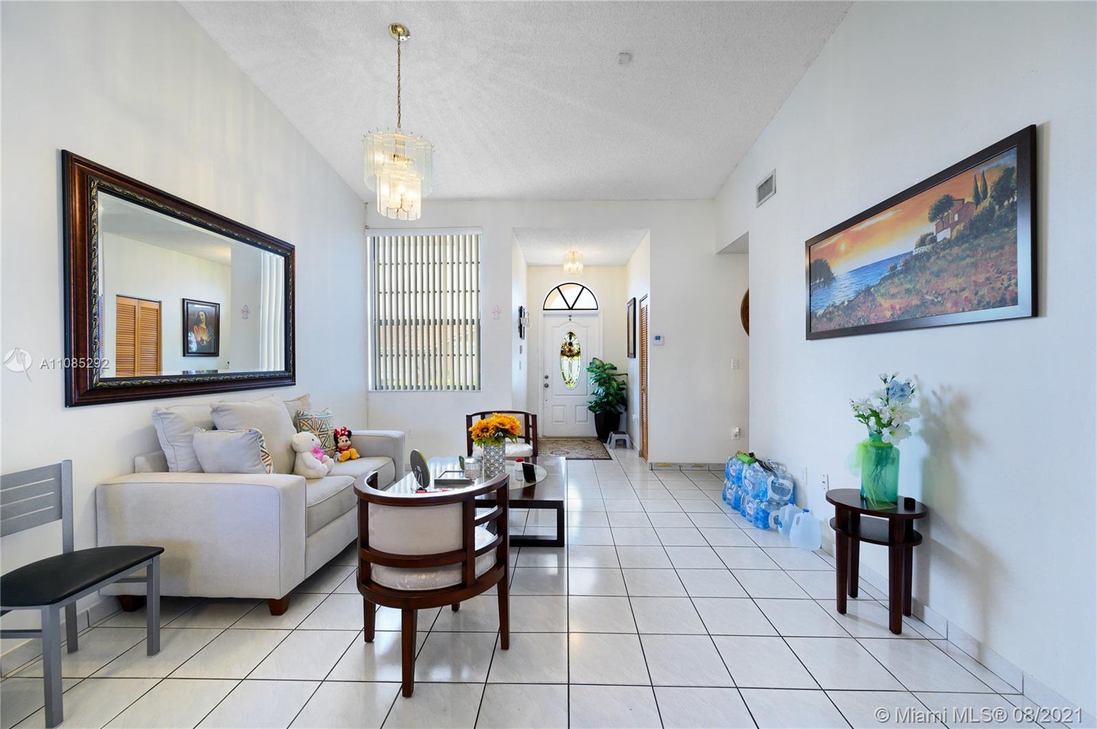 14468 Southwest 50th Terrace Miami, FL 33175 - Photo 2 of 15 a living room with furniture