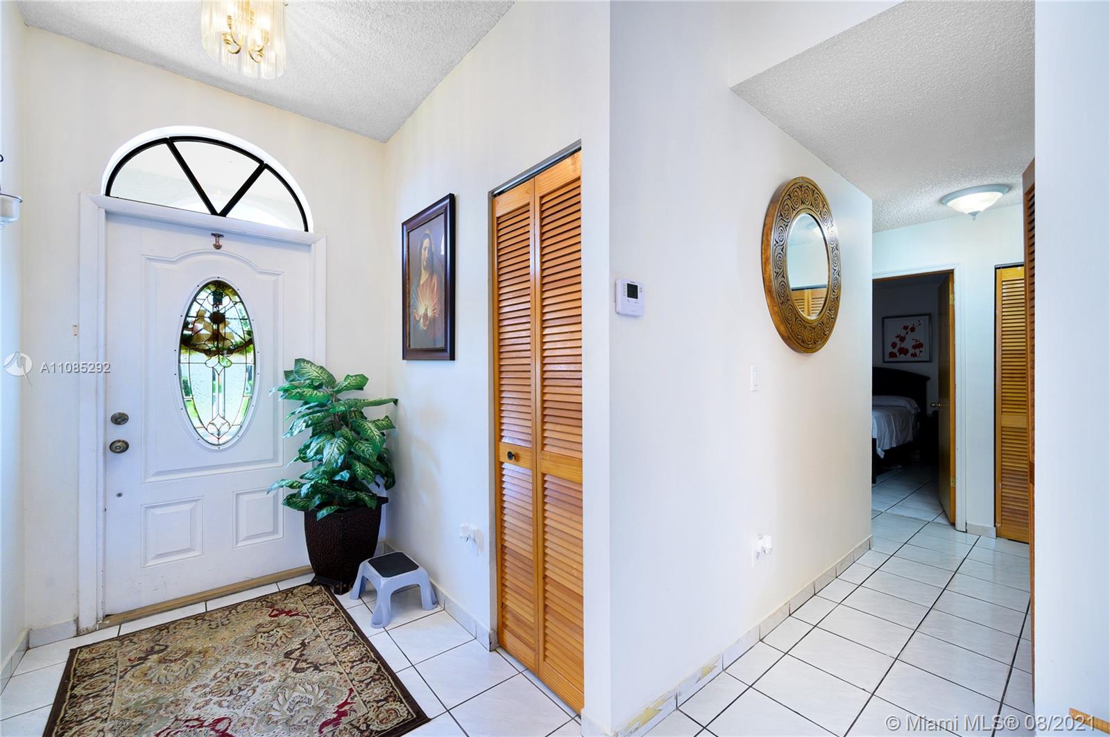 14468 Southwest 50th Terrace Miami, FL 33175 - Photo 10 of 15 a front view of a house with garden