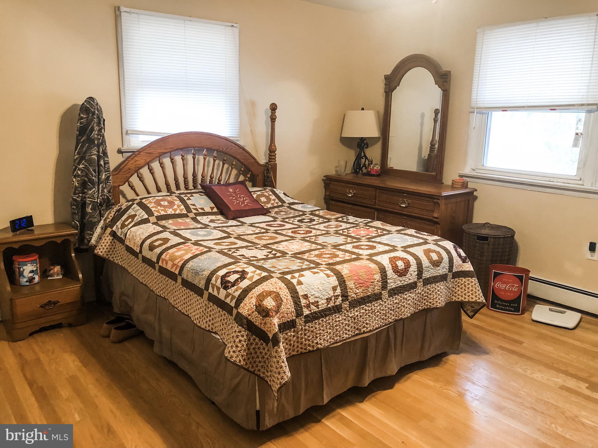 732 Lucabaugh Mill Road Westminster, MD 21157 - Photo 53 of 82 Master Bedroom with Full Bath and hardwood floors