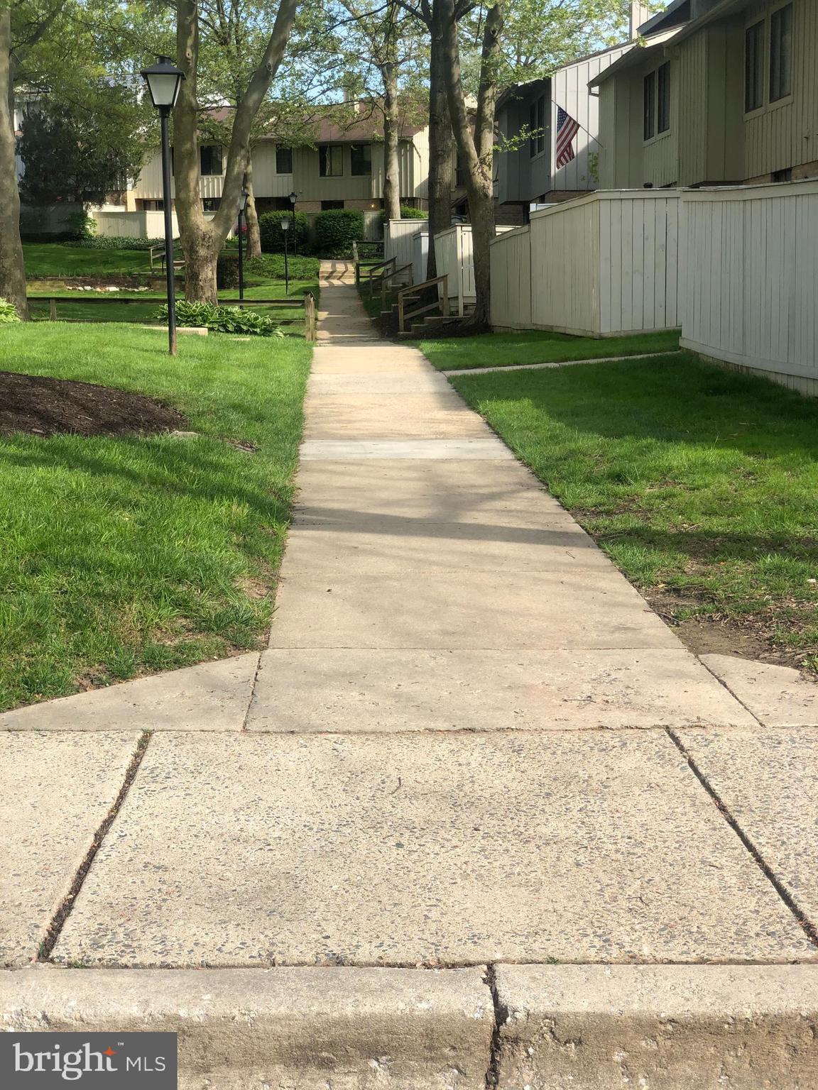 11245 Powder Run, Unit 104 Columbia, MD 21044 - Photo 2 of 42 Walk way to the house from parking lot