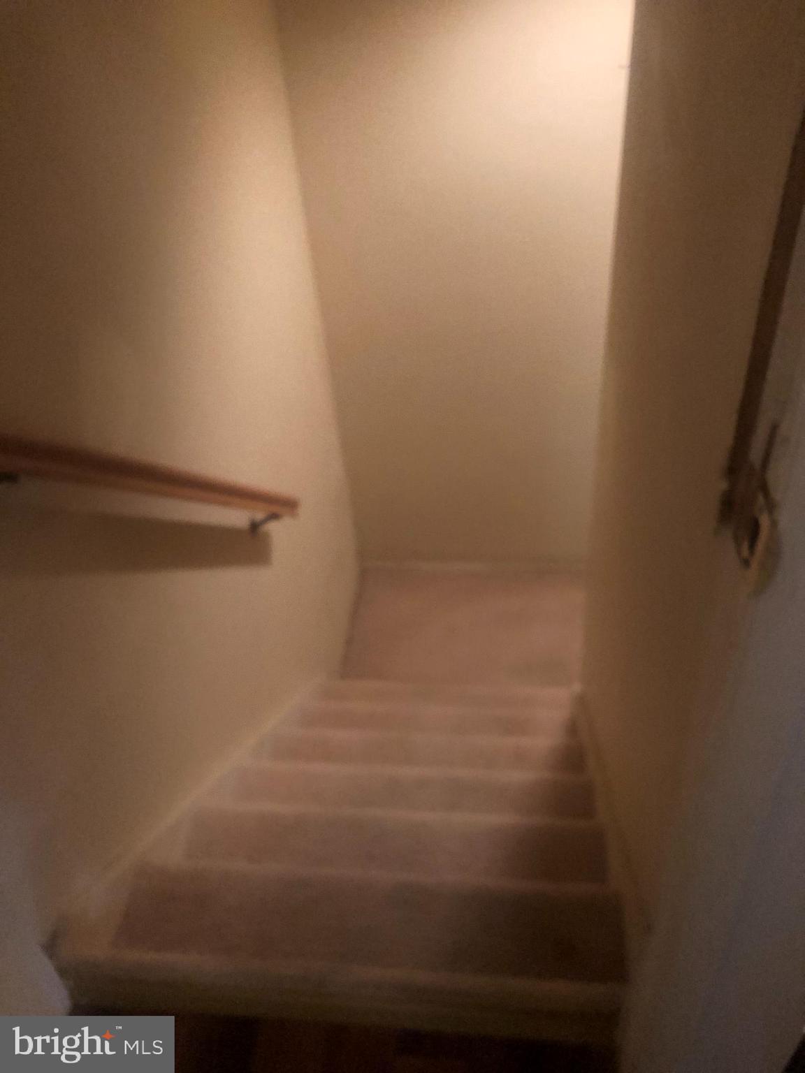 11245 Powder Run, Unit 104 Columbia, MD 21044 - Photo 29 of 42 Stairs for Basement