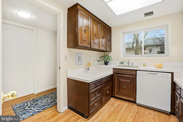 a bathroom with a sink a vanity and a mirror