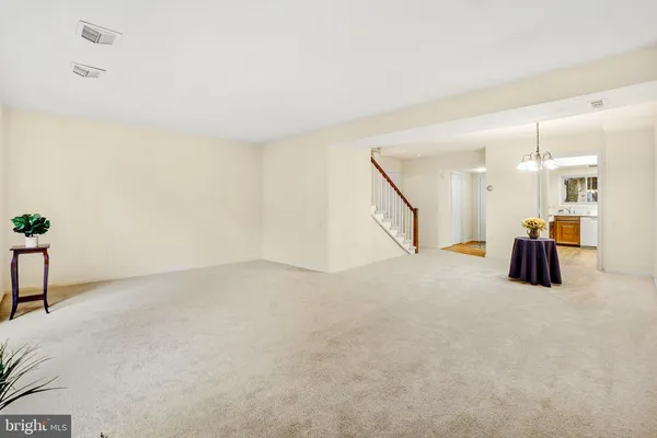 a view of a livingroom with a staircase