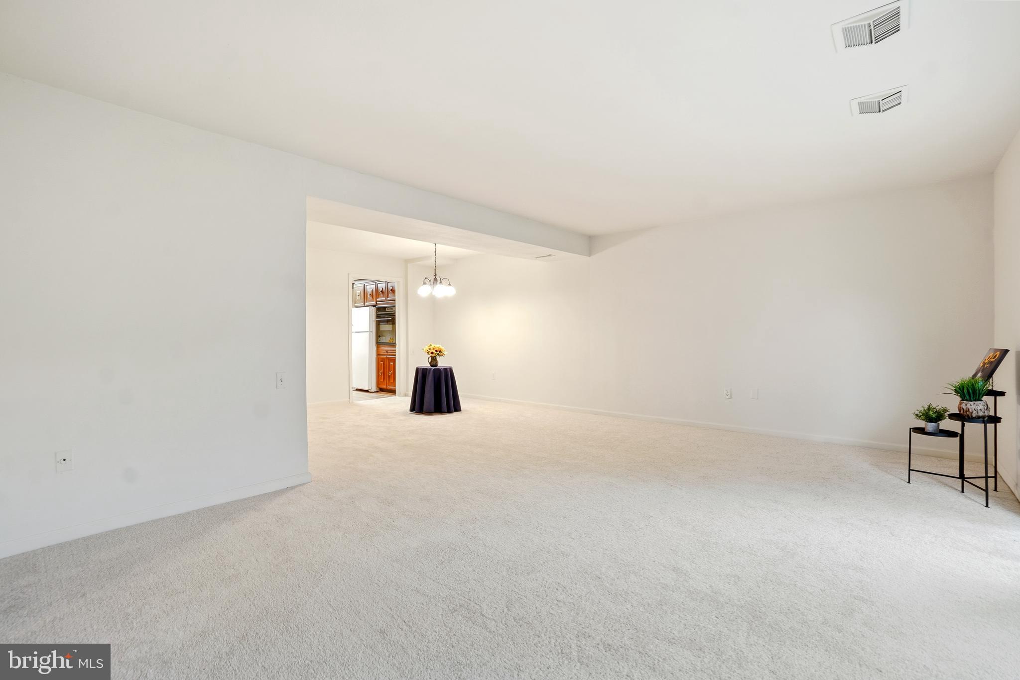 3387 South Leisure World Boulevard, Unit 91G Silver Spring, MD 20906 - Photo 24 of 29 Living/Dining Rooms
