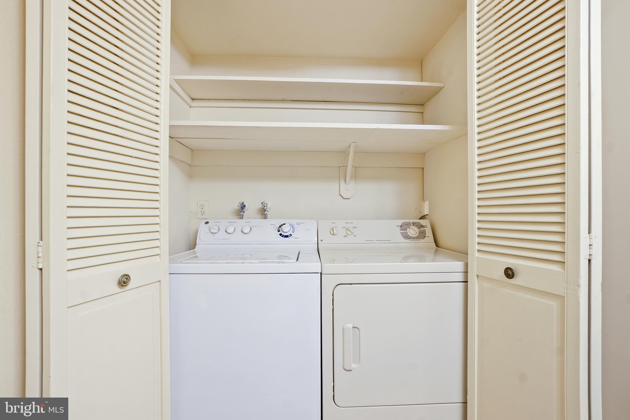 3387 South Leisure World Boulevard, Unit 91G Silver Spring, MD 20906 - Photo 25 of 29 Laundry Closet in Powder Room