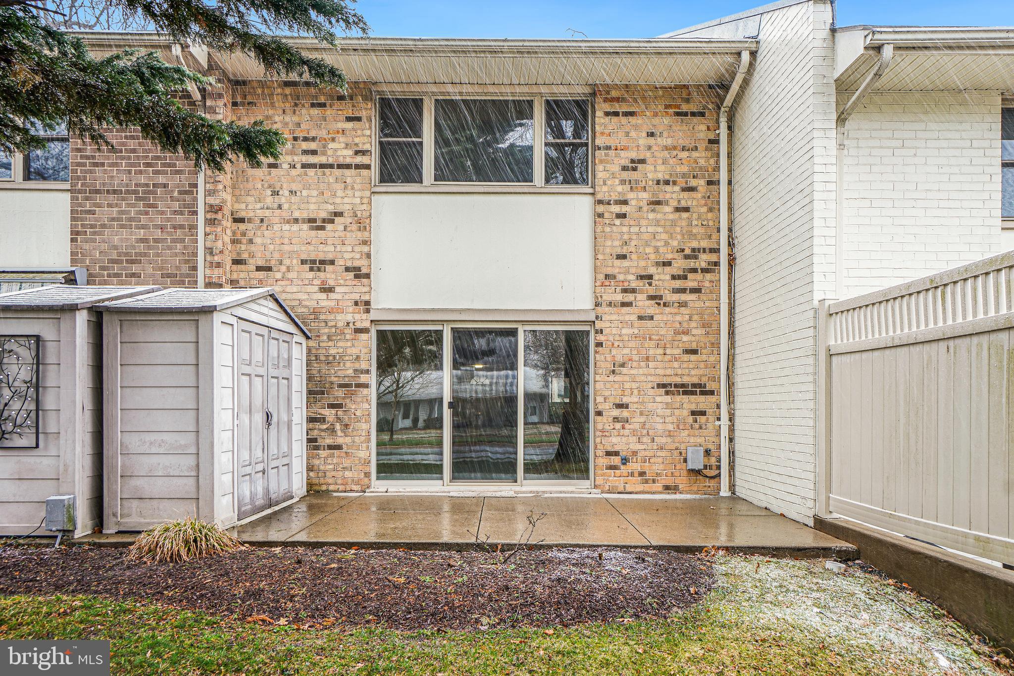3387 South Leisure World Boulevard, Unit 91G Silver Spring, MD 20906 - Photo 27 of 29 Rear of Unit with Paito