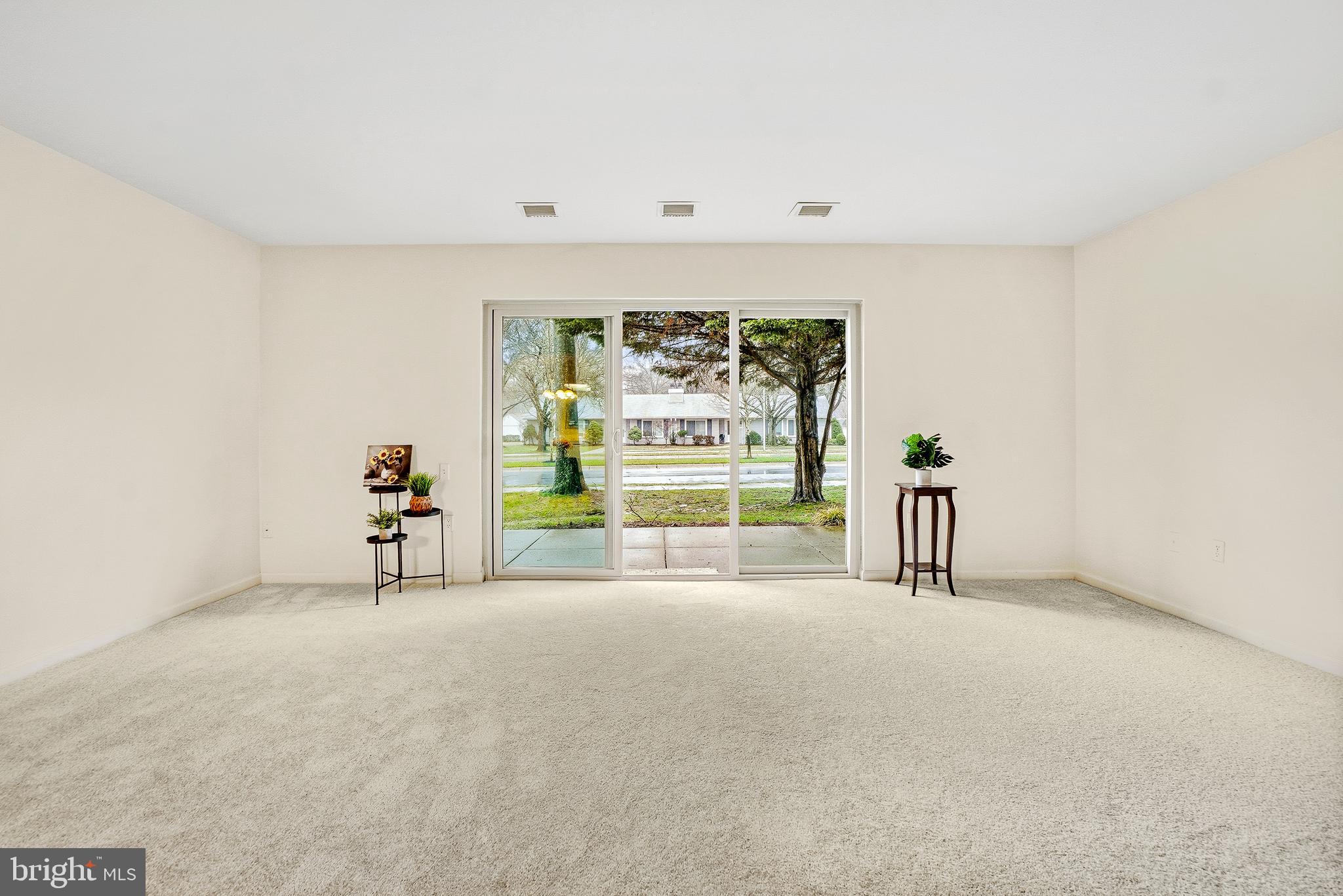 3387 South Leisure World Boulevard, Unit 91G Silver Spring, MD 20906 - Photo 4 of 29 Living Room with Sliding Glass Door to Patio