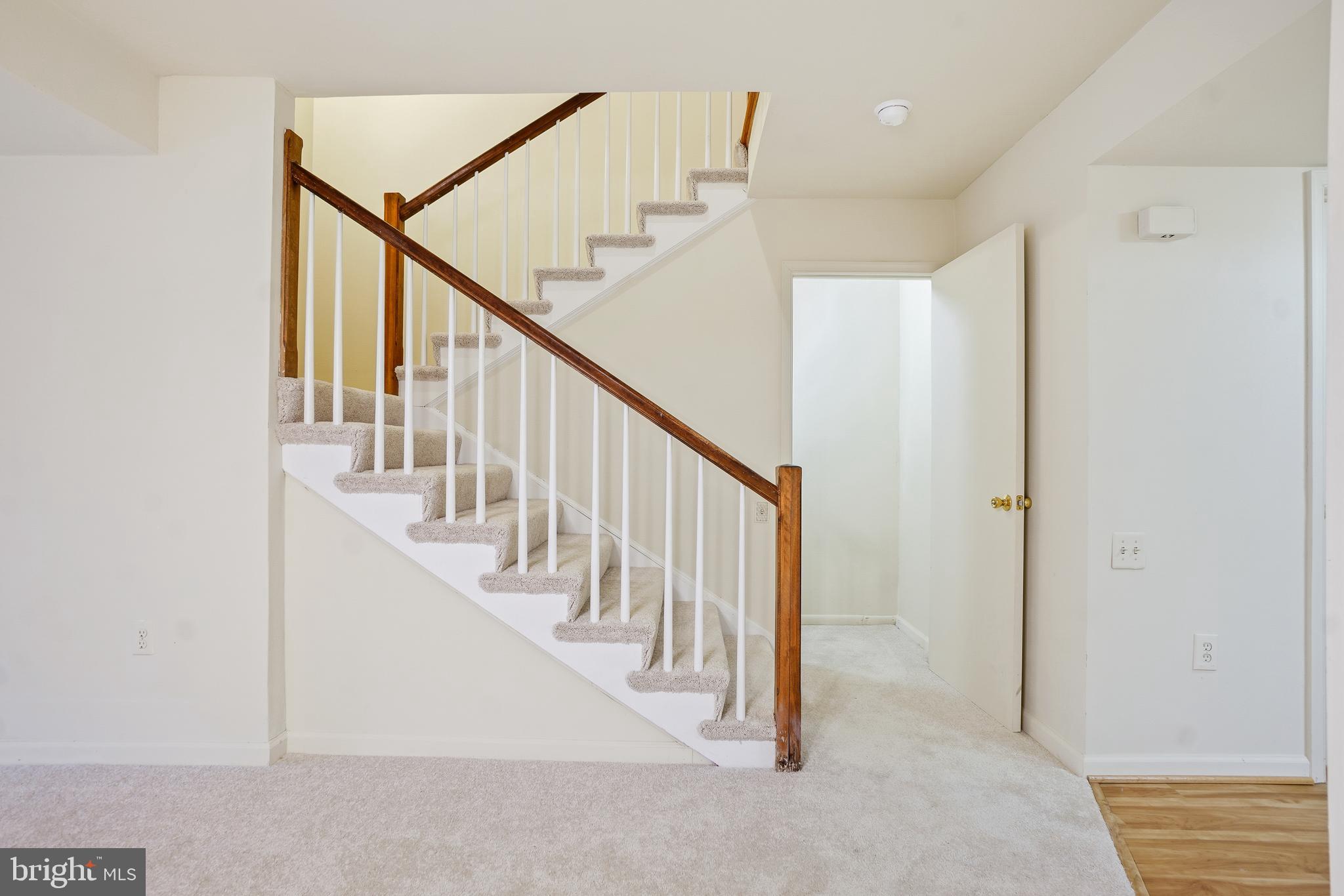 3387 South Leisure World Boulevard, Unit 91G Silver Spring, MD 20906 - Photo 6 of 29 Staircase to Upper Level