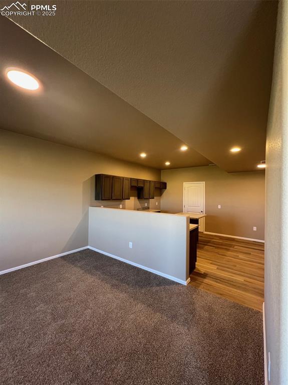1874 Sandtoft Heights Colorado Springs, CO 80951 - Photo 2 of 31 a view of a big room with wooden cabinet
